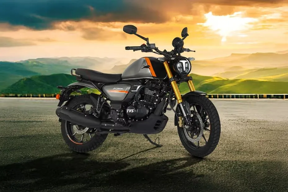TVS Ronin parked on a road at sunset
